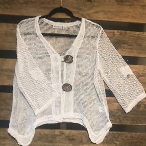 Open weave sweater with large coconut buttons